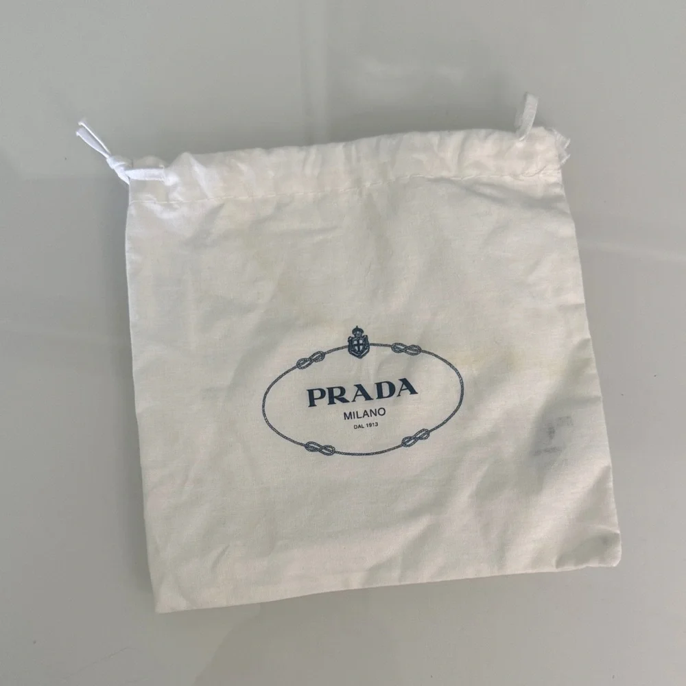 Prada small White Dust Pouch with Navy Logo some discoloration